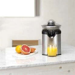 Cuisinart Presse-Agrumes électrique Centrifugeuse 100 W CCJ210E -Cuisine Appareils Magasin 78079 1 2 Presse Agrumes electrique centrifugeuse 100 W CCJ210E Cuisinart